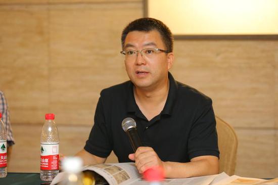 中国美术出版总社副编审教富斌