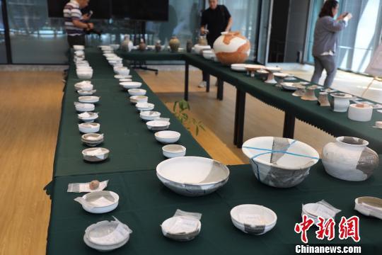 图为梅里遗址出土的文物遗存。管亦鸣 摄