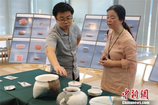 图为文物遗存进行展示。管亦鸣 摄