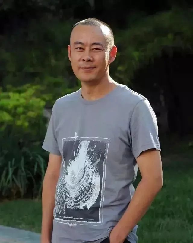 徐 展